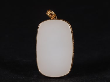 An Exquisite White Jade Pendant