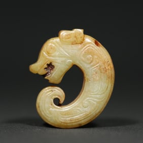 An Exquisite White Jade Dragon Pendant