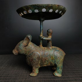 An Exquisite Bronze Rhinoceros-Shaped Candlestick