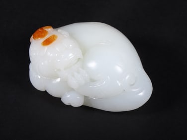 An Exquisite White Jade Auspicious Beast Ornament