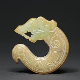An Exquisite White Jade Dragon Pendant