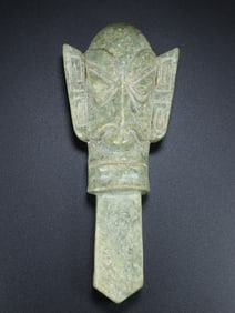 An Exquisite White Jade Mask Ornament