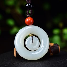 An Exquisite White Jade Pendant