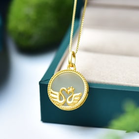 An Exquisite Sterling Silver-Gold Plated Inlaid White Jade Pendant