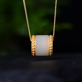 An Exquisite Sterling Silver-Gold Plated Inlaid White Jade Pendant