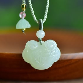 An Exquisite White Jade Pendant