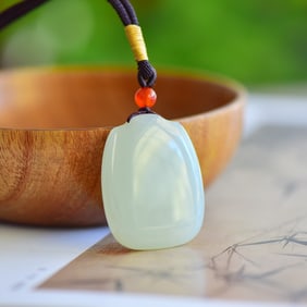 An Exquisite White Jade Pendant