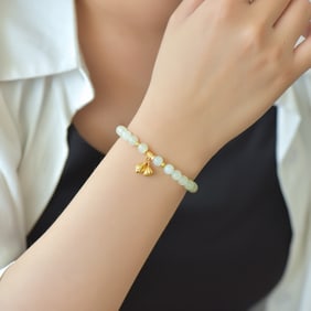 An Exquisite Greenish Jade Bracelets