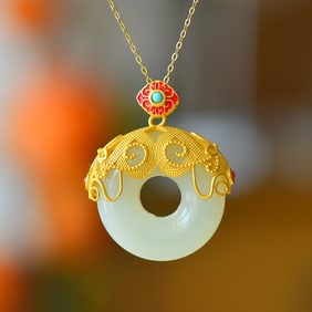 An Exquisite Sterling Silver-Gold Plated Inlaid White Jade Pendant