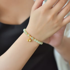 An Exquisite Greenish Jade Bracelets