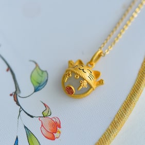 An Exquisite Sterling Silver-Gold Plated Inlaid White Jade Pendant