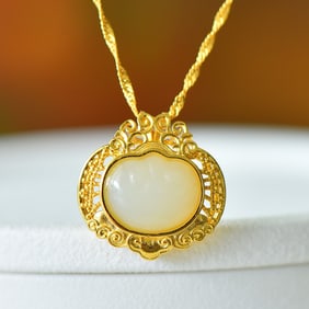 An Exquisite Sterling Silver-Gold Plated Inlaid White Jade Pendant