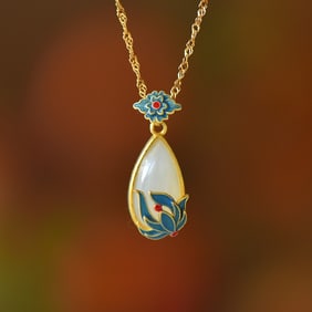 An Exquisite Sterling Silver-Gold Plated Inlaid White Jade Pendant