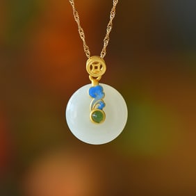 An Exquisite Sterling Silver-Gold Plated Inlaid White Jade Pendant