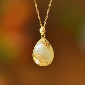 An Exquisite Sterling Silver-Gold Plated Inlaid White Jade Pendant
