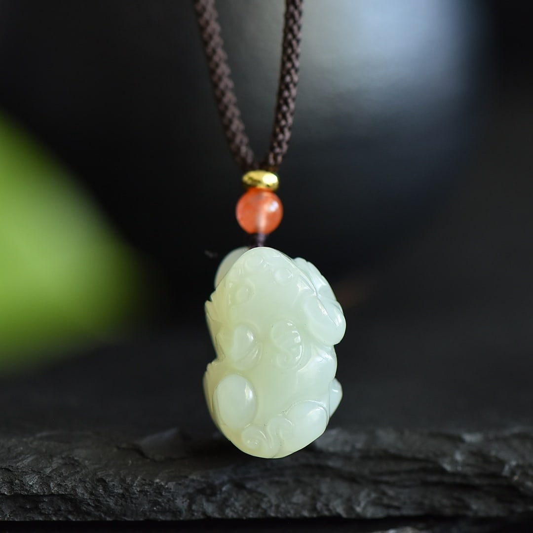 An Exquisite White Jade Auspicious Beast Pendant: An Exquisite White Jade Auspicious Beast Pendant,Size:14mmx23mm ???: ???? ?????? ???? ??????
