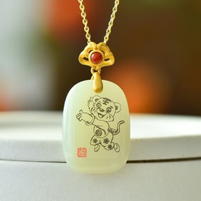 An Exquisite Sterling Silver-Gold Plated Inlaid White Jade Pendant