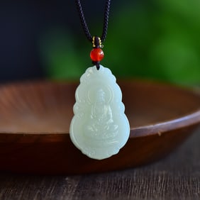 An Exquisite White Jade Bodhisattva Pendant