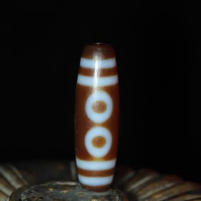 An Exquisite Five Eyes Dzi Bead Pendant