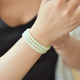 An Exquisite Greenish Jade Bracelets