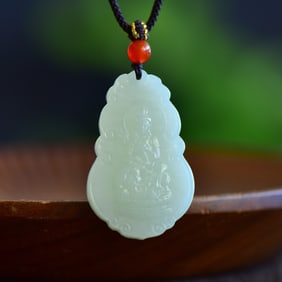 An Exquisite White Jade Bodhisattva Pendant