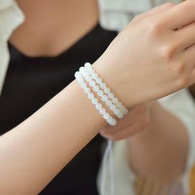 An Exquisite White Jade Bracelets