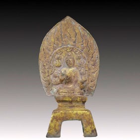 A Solemn Gilt Bronze Buddha