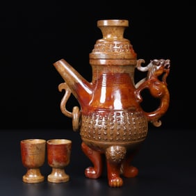A Set of Fine Archaic Jade Dragon-Ears Tripod Teapot,with three Cups