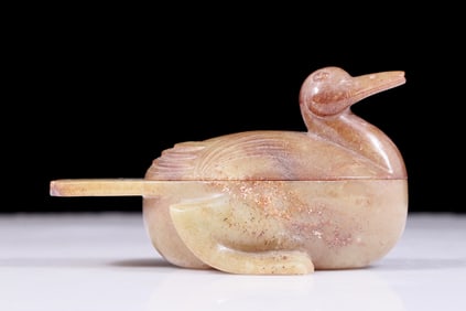 An exquisite white jade duck-shaped box
