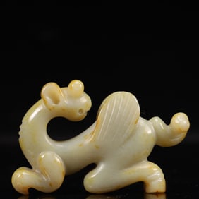 An Archaic Hongshan Culture White Jade Beast Pendant
