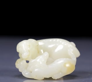 An Exquisite White Jade Dog Ornament