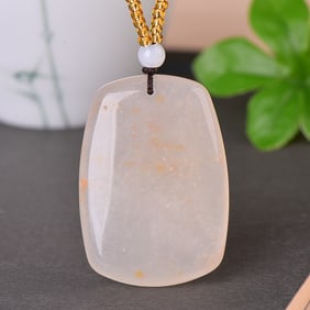 An Exquisite White Jade Pendant