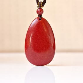 An Exquisite Cinnabar Pendant