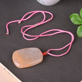 An Exquisite Red Jade Pendant