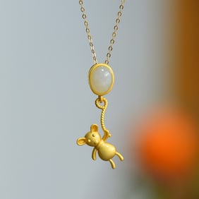 An Exquisite Sterling Silver-Gold Plated Inlaid White Jade Pendant