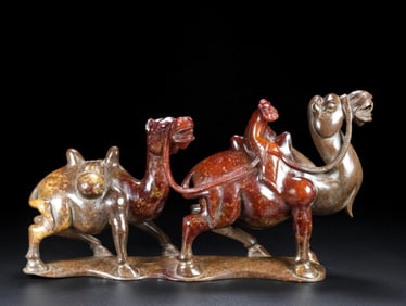 An Exquisite White Jade Camel Ornament