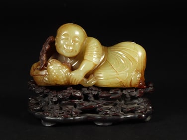 An Exquisite Yellow Jade Figure Ornament