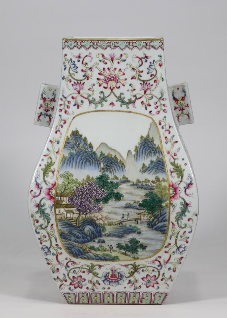 An Exquisite Famille-Rose Lotus Pattern Landscape Pattern Double-Ears Vase: An Exquisite Famille-Rose Lotus Pattern Landscape Pattern Double-Ears Vase Qing Dynasty, China Size:12.6inx7.9in粉彩山水贯耳四方瓶 中国