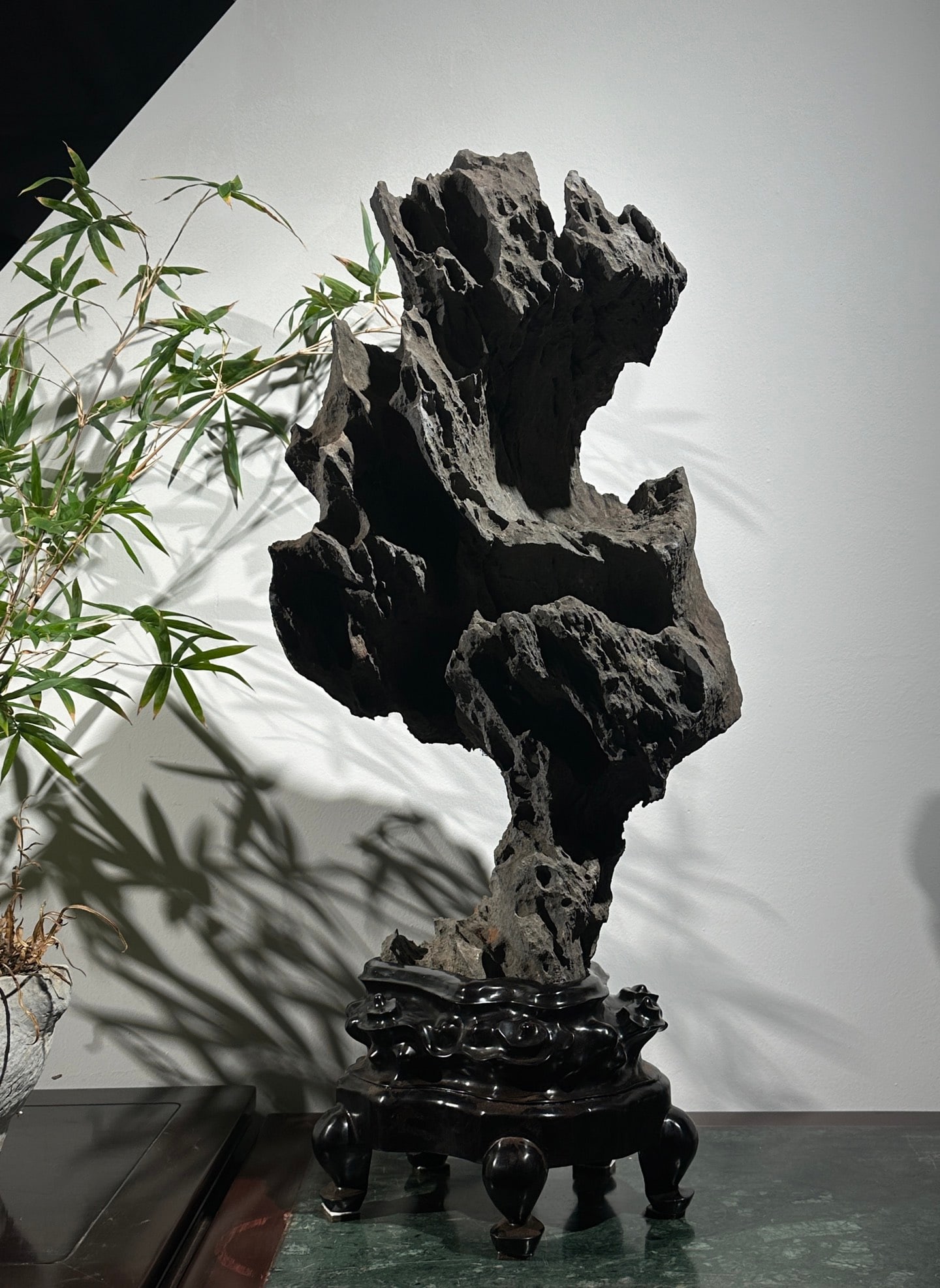 An Exquisite Lingbi Stone Ornament: An Exquisite Lingbi Stone Ornament Qing Dynasty, China Size:31.5inx14.2inx9.4in灵璧石立供摆件 中国清代 Size:80cmx36cmx24cm