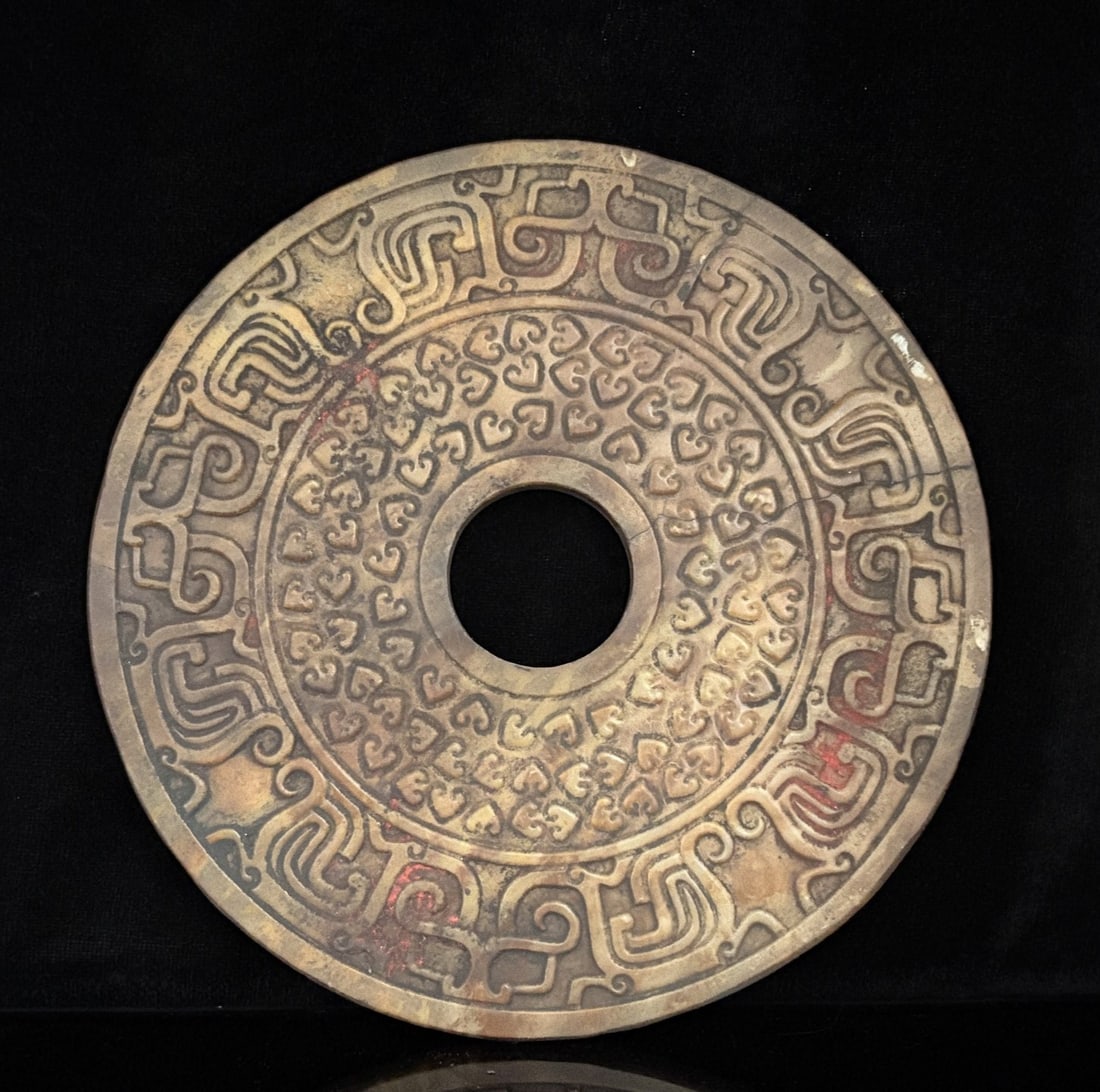 An Exquisite White Jade Beast-Face Pattern Ornament: An Exquisite White Jade Beast-Face Pattern Ornament Han Dynasty, China Size:6.3inx0.2in Weight:327g白玉牛头纹玉璧 中国汉代 Size:16cmx0