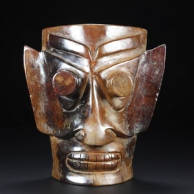 An Exquisite White Jade Mask Ornament