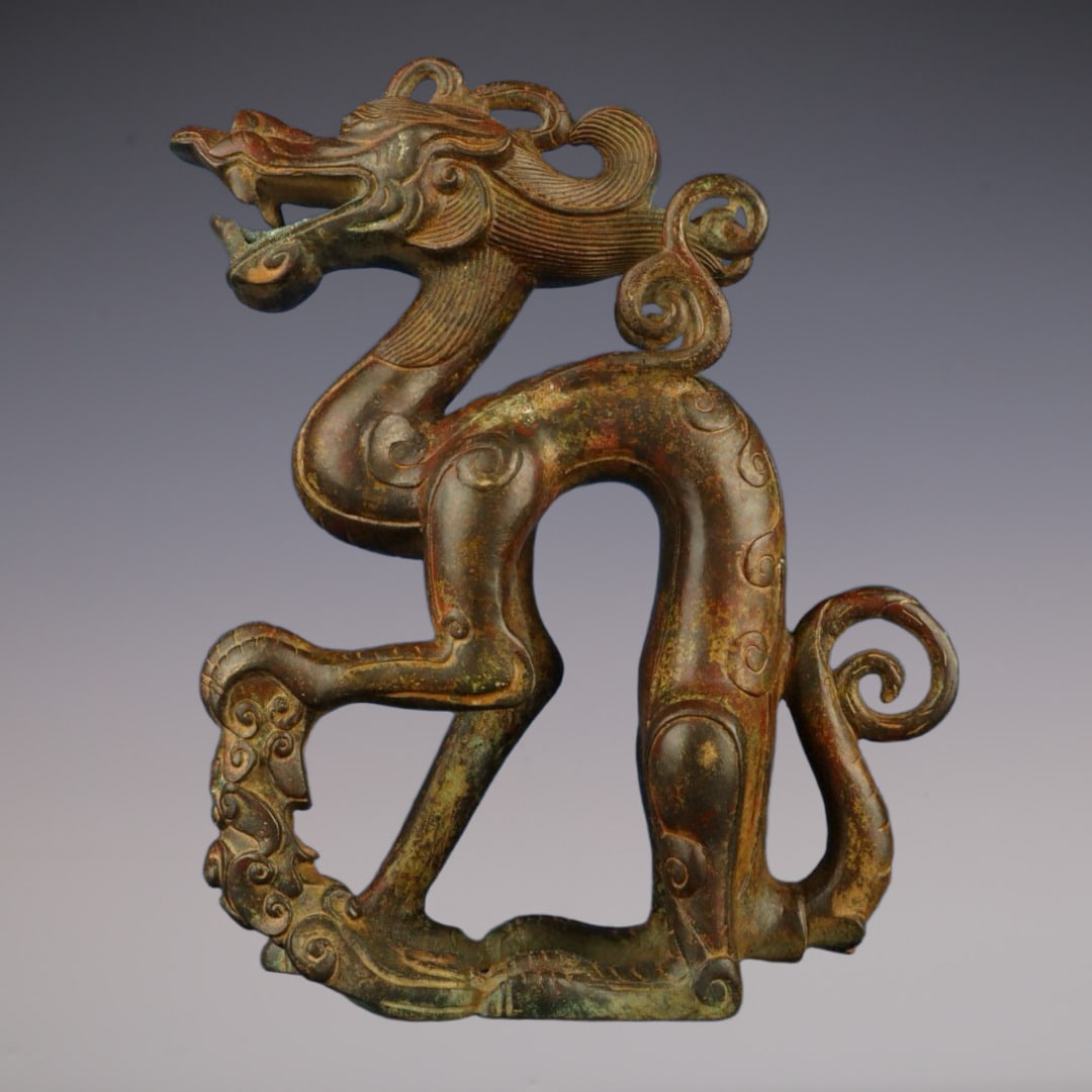 An Exquisite Bronze With Inscription Dragon Ornament (1 of 9)