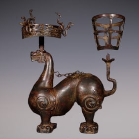 An Exquisite Bronze Auspicious Beast-Shaped Candlestick