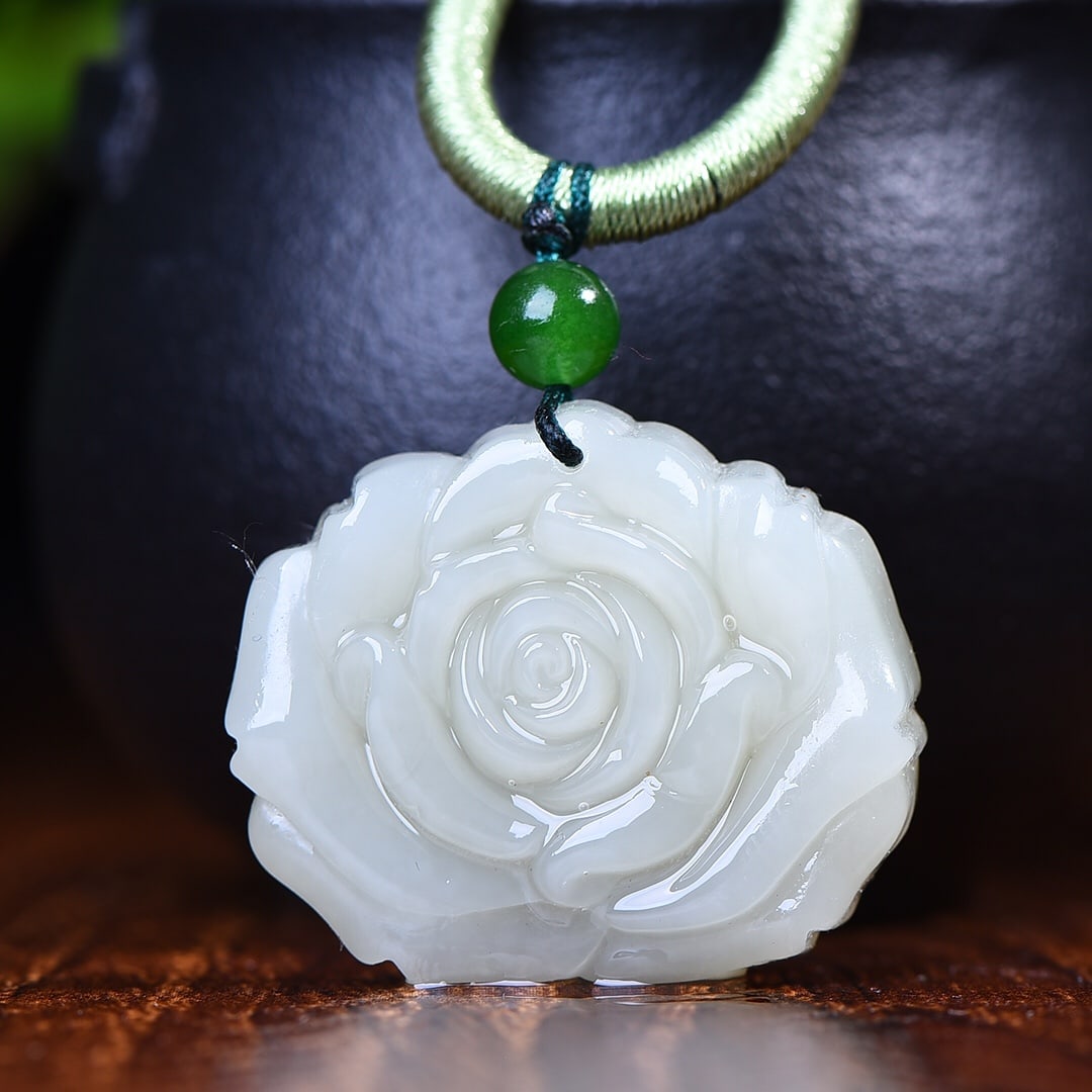 An Exquisite White Jade Flower Pendant: An Exquisite White Jade Flower Pendant,Size:34mmx29mm (???)???????? ????? ?????