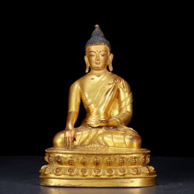 An exquisite gilt bronze statue of Sakyamuni