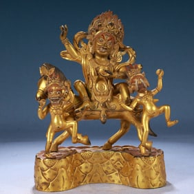 A Solemn Gilt Bronze Statue of Mammon Rides the Horse