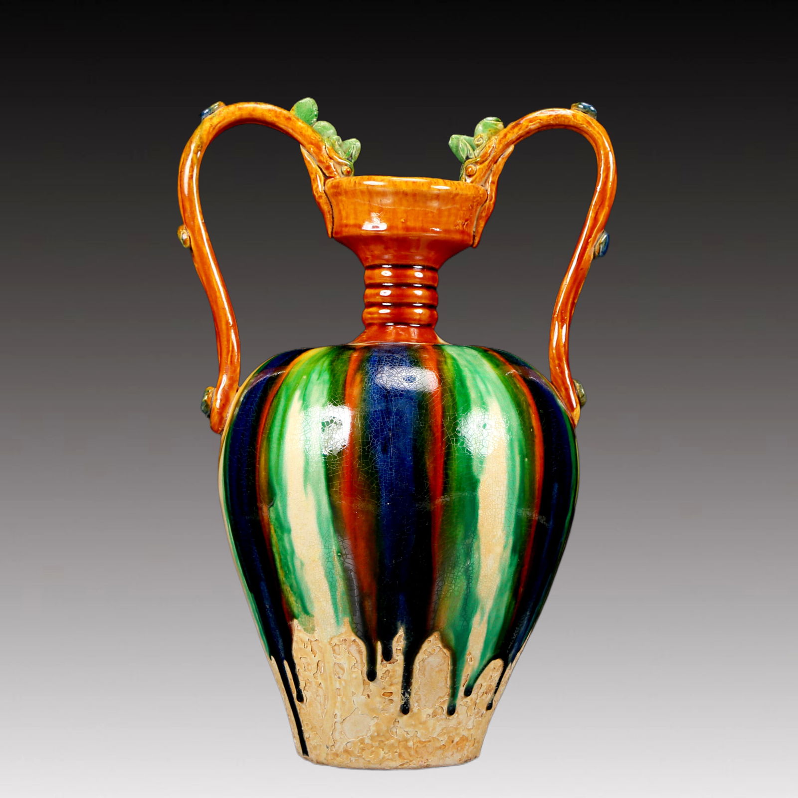 A Rare Tang Tri-Color Glazed Pottery Double Dragon Ears Vase: A Rare Tang Tri-Color Glazed Pottery Double Dragon Ears Vase,Tang Dynasty, China,Chinese Tang Tri-colored Pottery, or Tang Sancai, flourished during the Tang Dynasty (618–907 AD). It's renowned