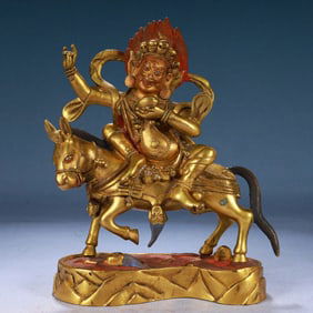 A Solemn Gilt Bronze Statue of Mammon Rides the Horse