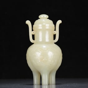 An exquisite greenish jade amphorae and tripod vase with dragon pattern