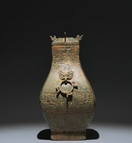 An Archaic Bronze Beast-Ears Bottle